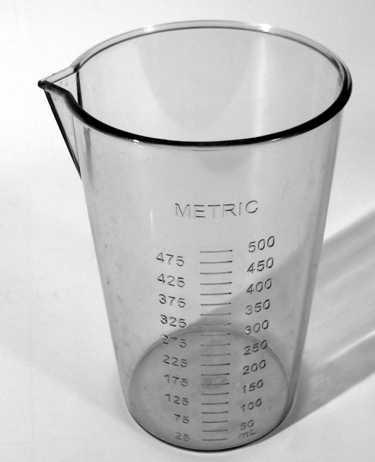 Verre doseur